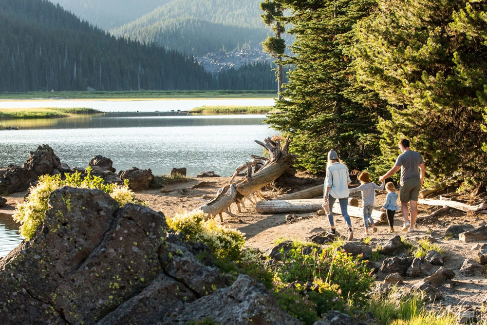 Trails | The nearly nine miles of paved paths and soft trails wind their way through forests of evergreens, across lush meadows and along lakes and streams Trails | The nearly nine miles of paved paths and soft trails wind their way through forests of evergreens, across lush meadows and along lakes and streams